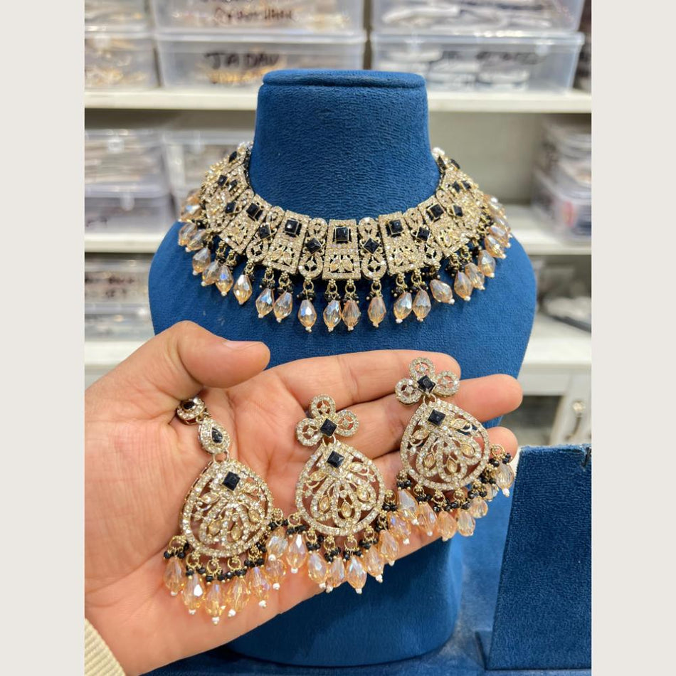 Pota Stone Choker in Gold Tone with Austrian Stones | Bridal Jewellery India