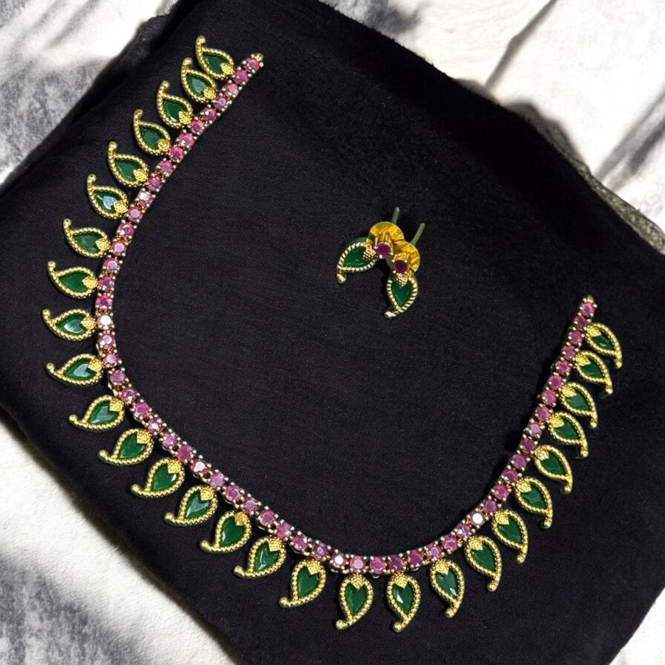 Rose Gold Plated Leaf Motif Necklace with Rubies and Emeralds | Bridal Jewellery India