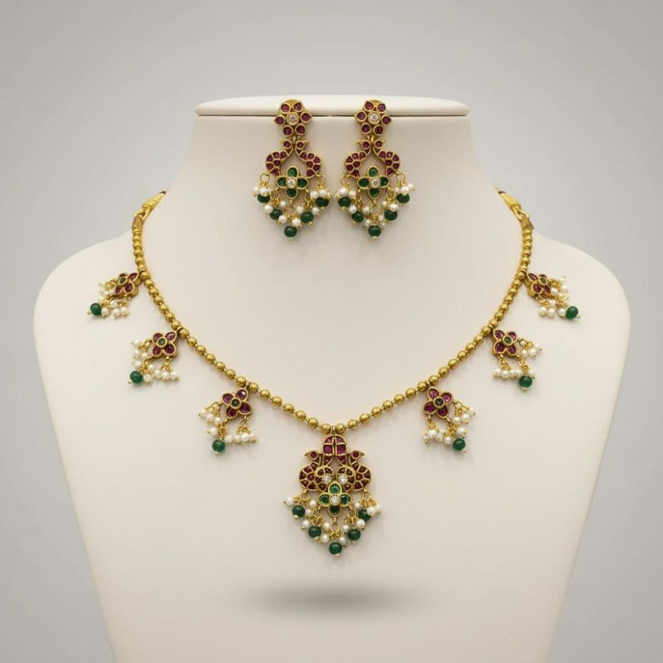Gilded Charm Necklace in Oxidised Silver | Bridal Jewellery India