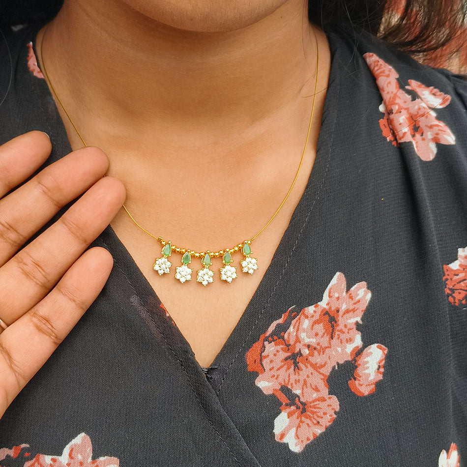 Elegant Green Diamond Invisible Necklace in Platinum | Bridal Jewellery India