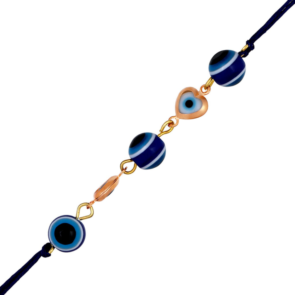 Gold Plated Auspicious Evil Eye Heart Rakhi for Brother | Bridal Jewellery India
