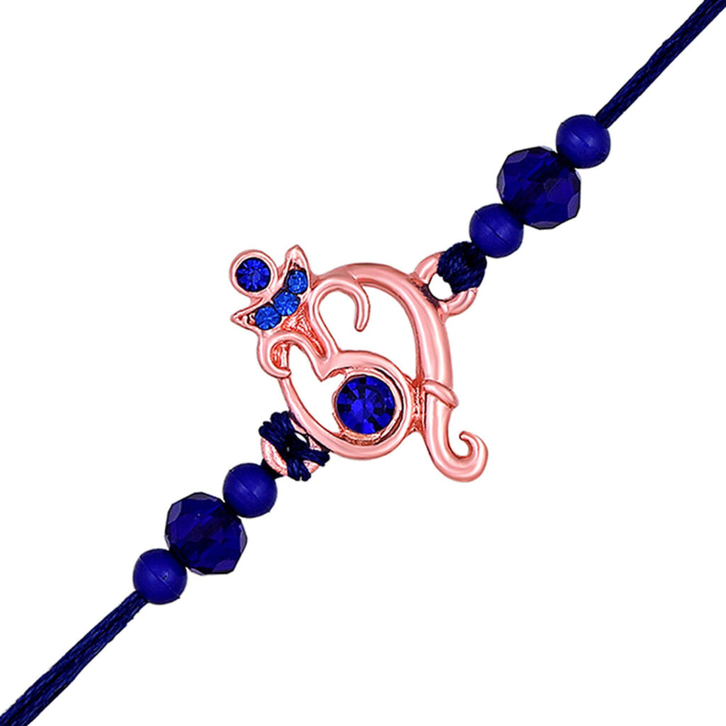 Rose Gold Plated Om and Ganpati Rakhi with Blue Crystals | Bridal Jewellery India